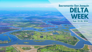 Graphic that includes an aerial view of the Sacramento-San Joaquin Delta's landscape, with winding waterways, wetlands, and agricultural fields. A text overlay reads: Sacramento-San Joaquin Delta Week, September 22-28, 2024.